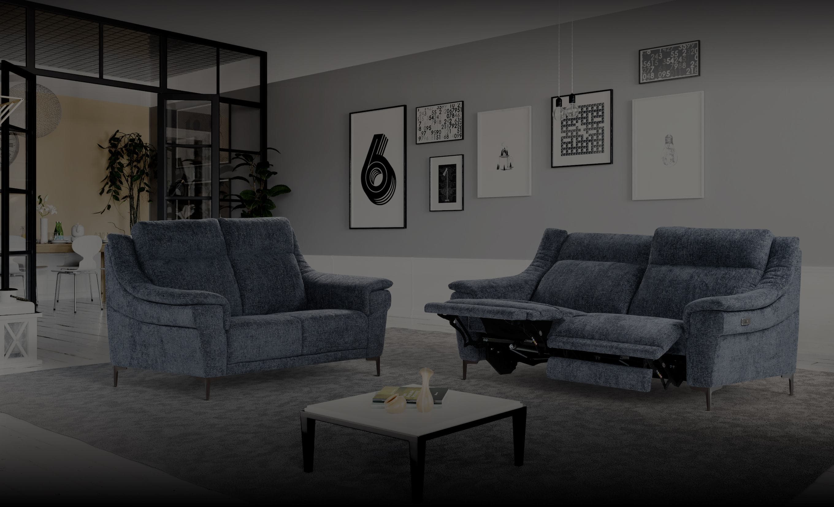 Nicoletti modern living room with grey fabric sofas, gallery wall and contemporary interior design